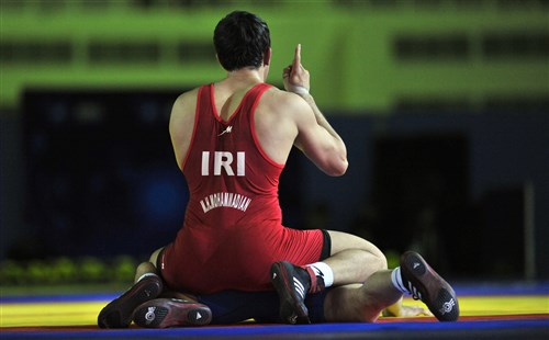 One silver, two bronze for Iran at first day of 2014 World Wrestling Championships